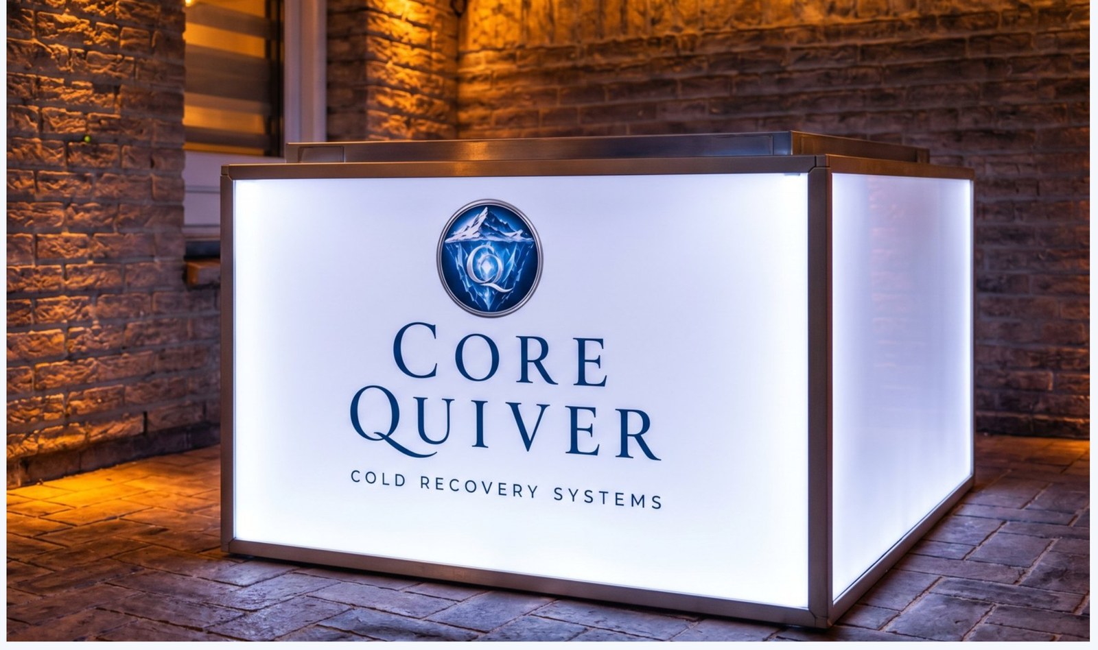 CoreQuiver Cube cold plunge system glowing with integrated LED lighting